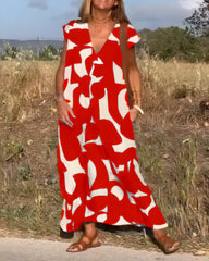 NOVERA™ | Jurk met print en V-hals