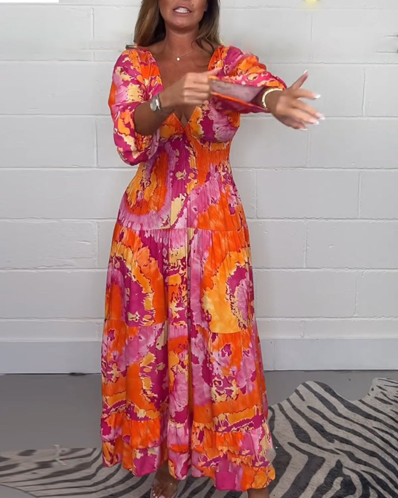 NOVERA™ | Diepe V kleurrijke lange jurk