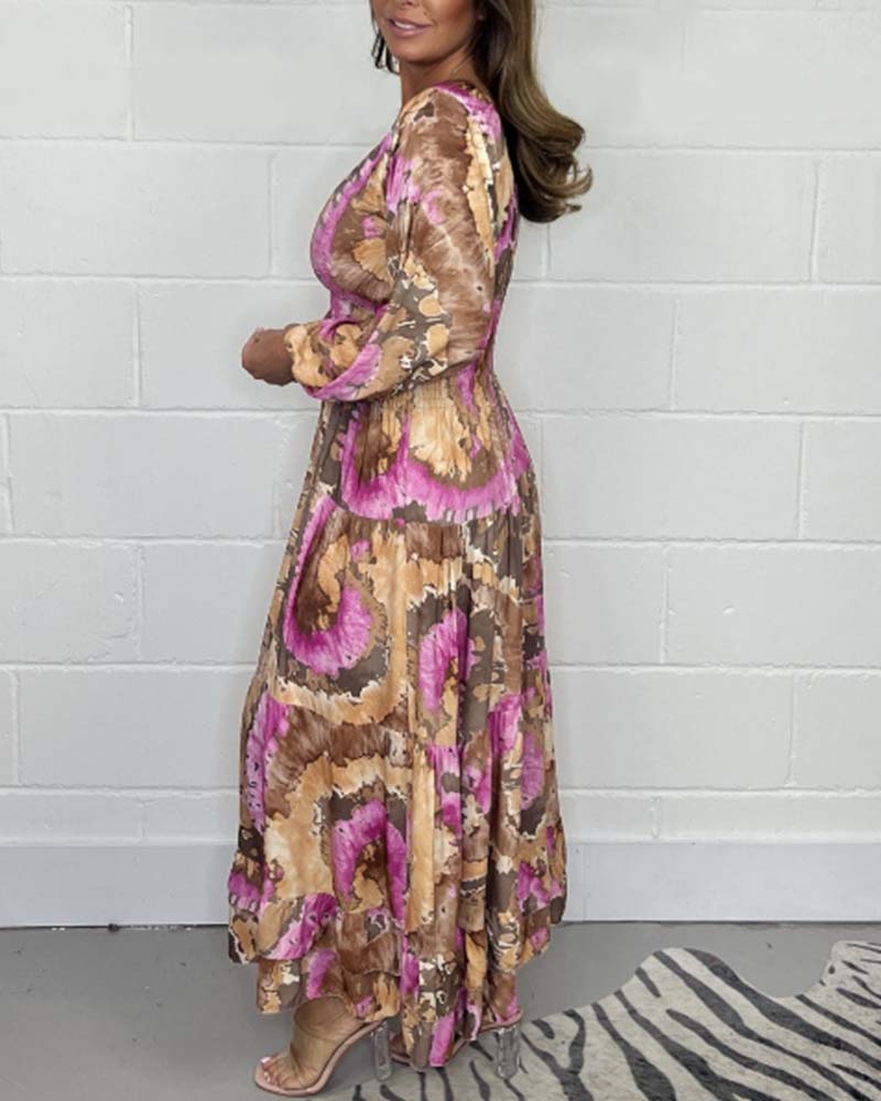 NOVERA™ | Diepe V kleurrijke lange jurk