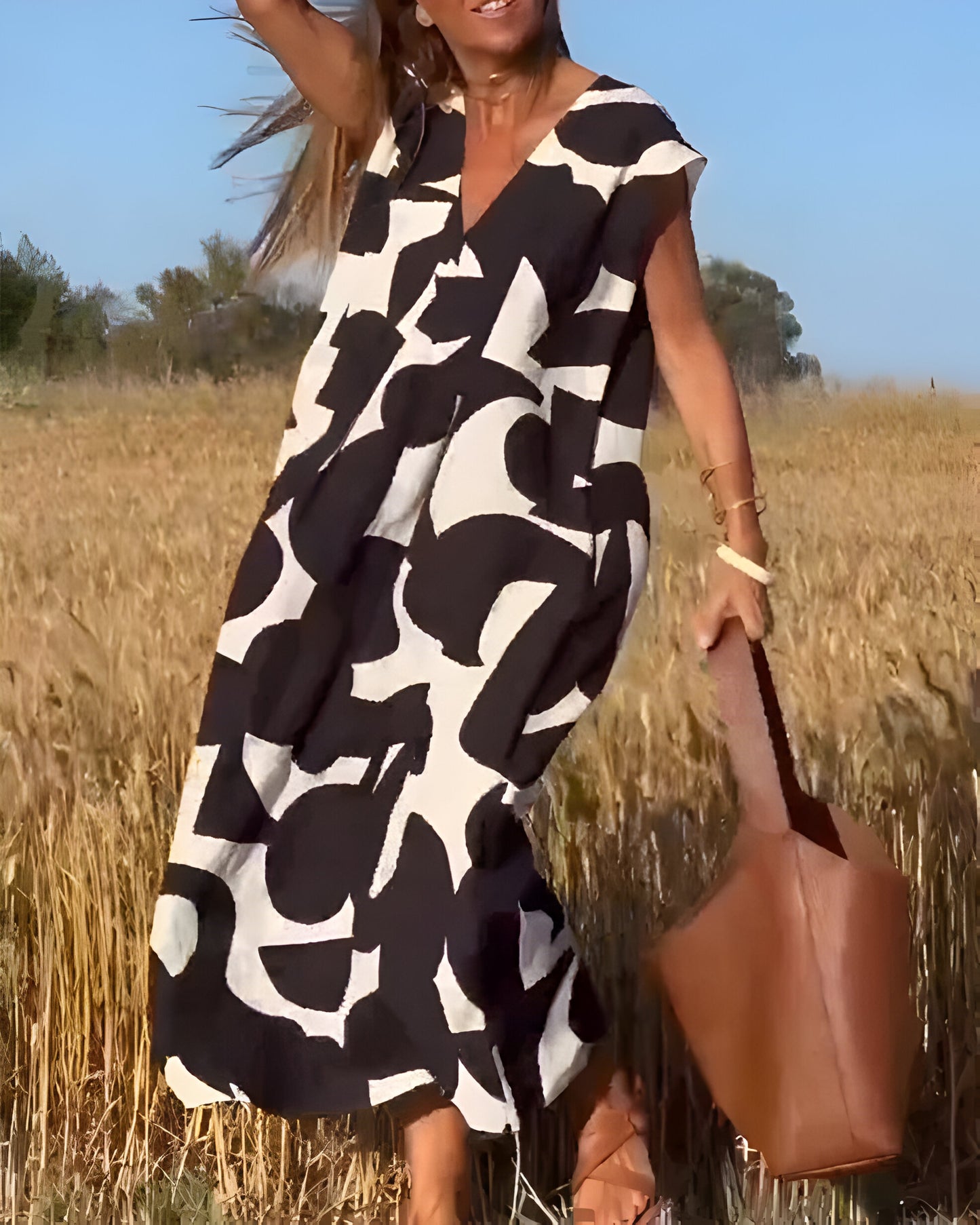 NOVERA™ | Jurk met print en V-hals