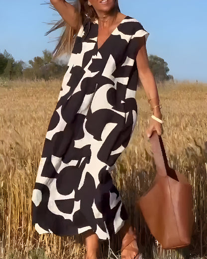 NOVERA™ | Jurk met print en V-hals