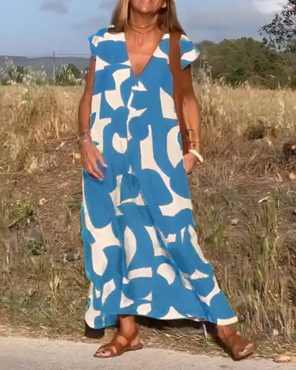 NOVERA™ | Jurk met print en V-hals