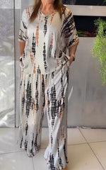 NOVERA™ | Casual tweedelig pak van satijn met ronde hals